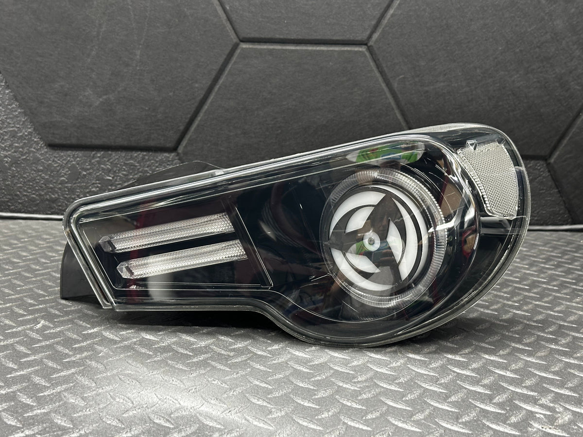 Spinning Black Housing Tail Lights (2012–2022 GT86 / BRZ / FR-S)
